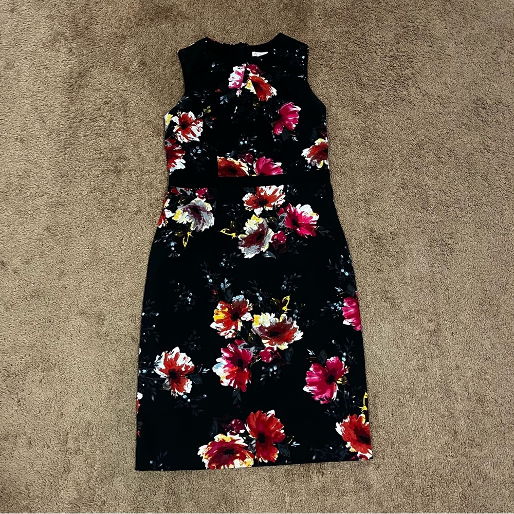 Mid length dress, with beautiful flowers from DB Established 1962.